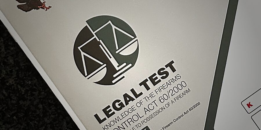 International Training Academy Legal Test manual — knowledge of the Firearms Control Act 60/2000, unit standard 117705, stamped by Cape Town Firearm Training Academy
