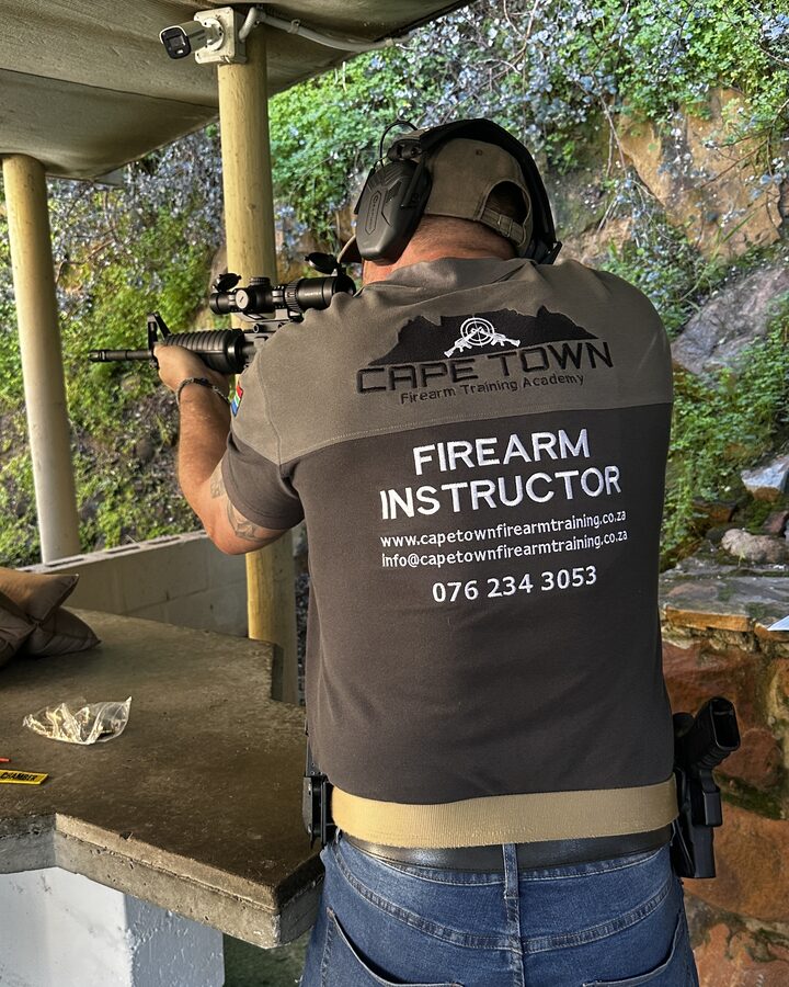 Cape Town Firearm Training Academy instructor on the line with a self-loading rifle at False Bay Firearm Shooting Range, Glencairn